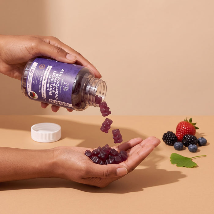 Mixed berries Ashwagandha gummies poured into a palm in evening light