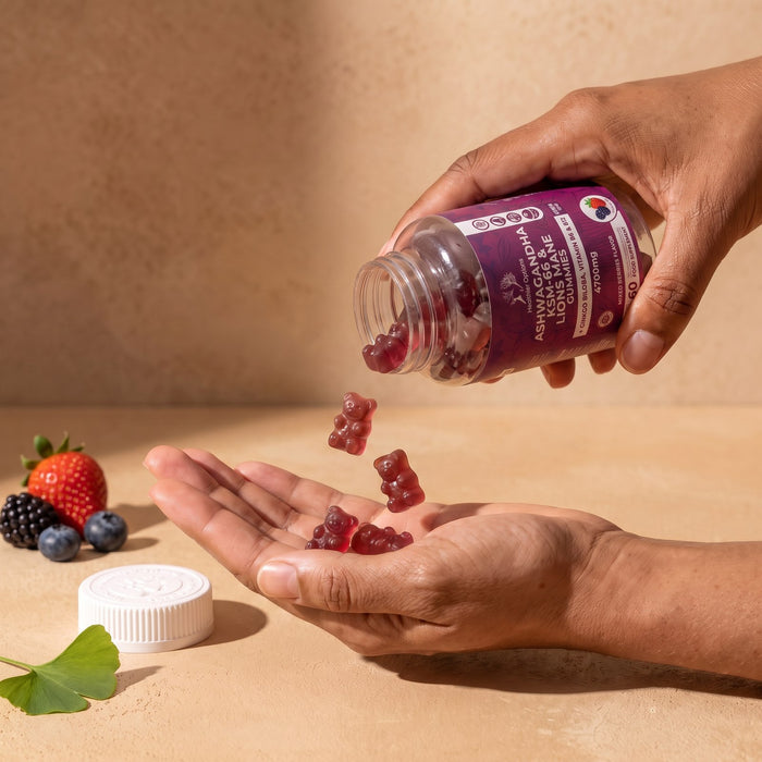 Mixed berries gummies with magnesium poured into a hand