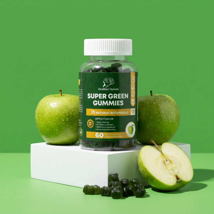 Super Greens gummies bottle on a podium with green apples