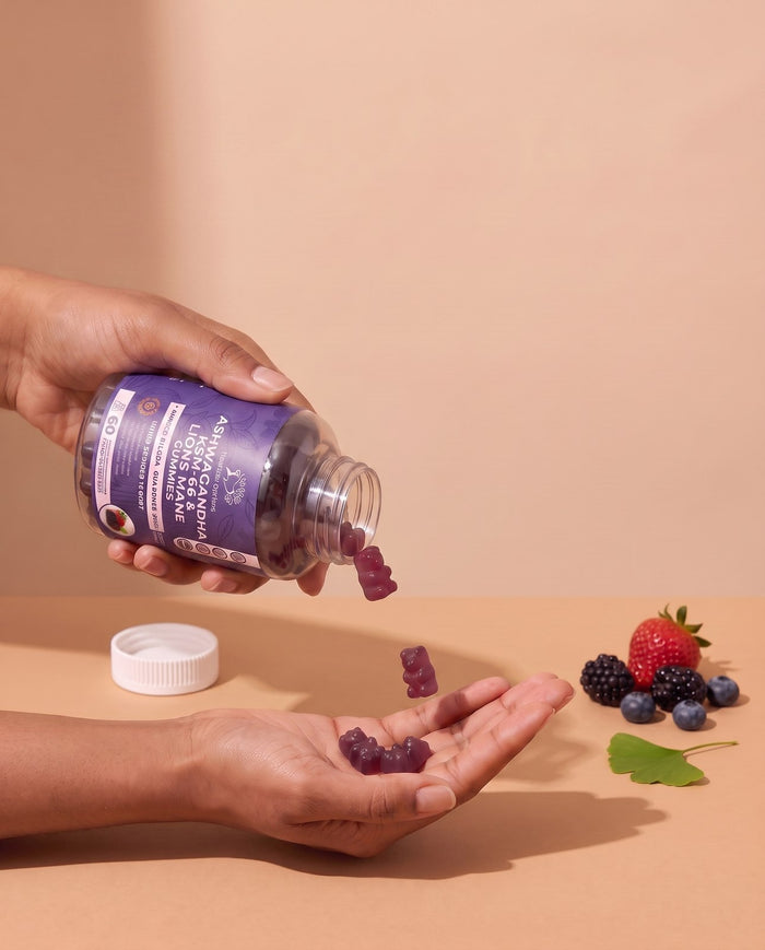 Pouring mixed berries Ashwagandha and Lion's Mane gummies with magnesium into a hand