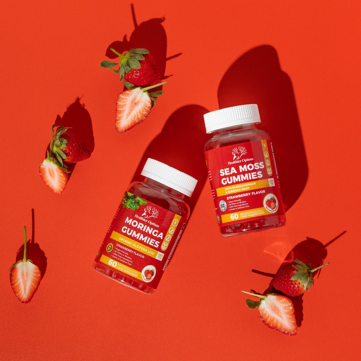 Sea Moss and Moringa strawberry flavour gummies with fresh strawberries