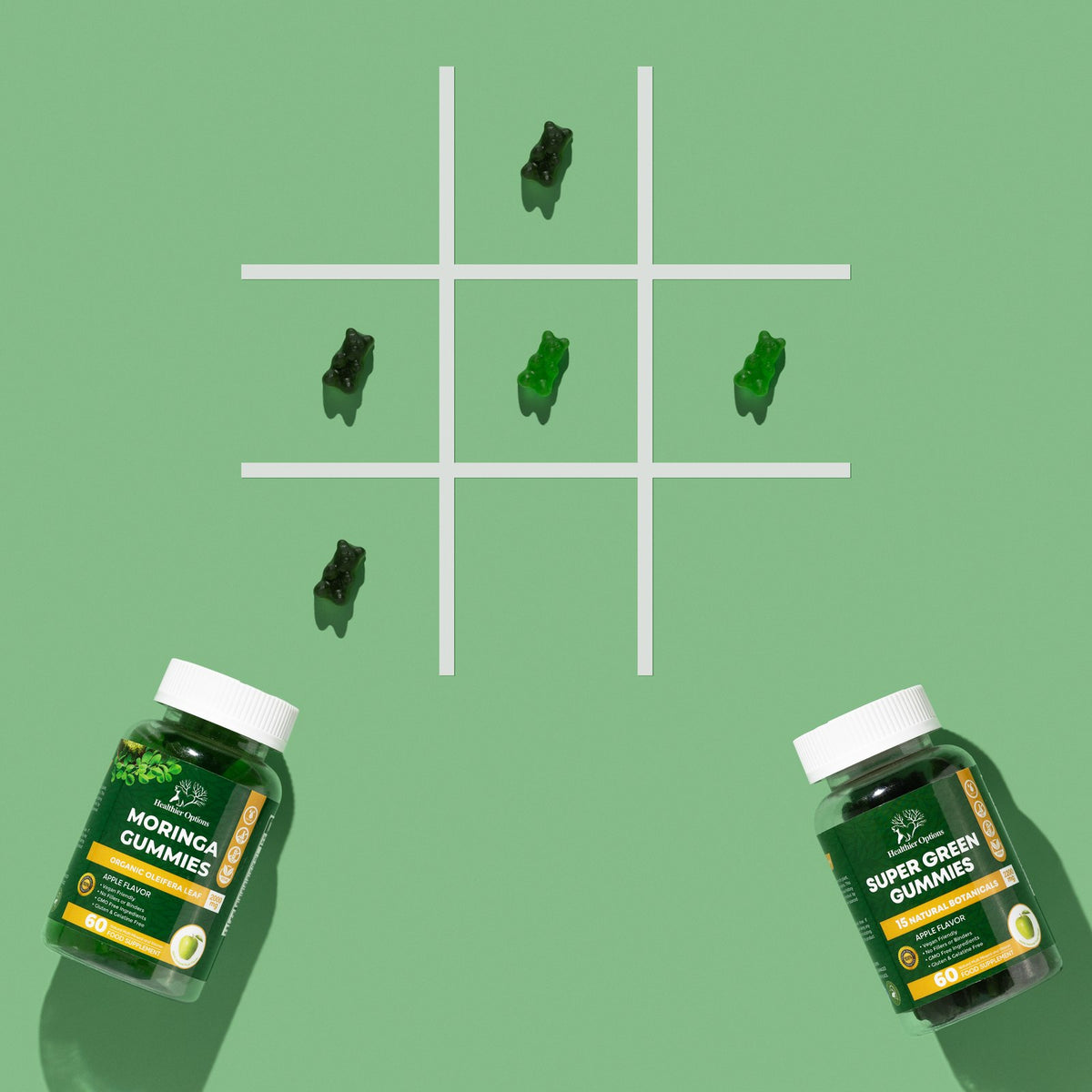 Green Healthier Options gummies bottles with gummy bears on a noughts and crosses grid