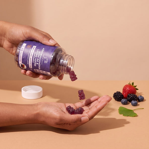 Mixed berries Ashwagandha gummies poured from the bottle into an open hand