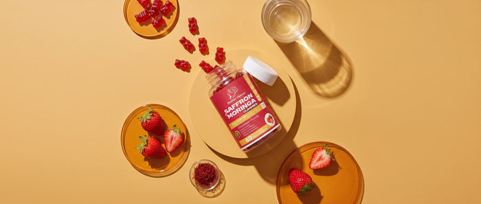 Saffron and Moringa calm and focus gummies on amber glass plates